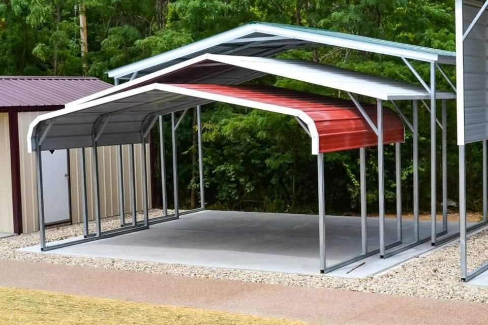 A metal structure with three different colored roofs.